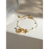 0604f8d2-7ced-4ee3-bc00-49ed7f94bab3.jpg 18K Gold Shell & Starfish Bracelet – Pearl Chain Summer Jewelry