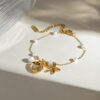 19d3a56d-1658-4ca1-b7f3-63029295f437.jpg 18K Gold Shell & Starfish Bracelet – Pearl Chain Summer Jewelry