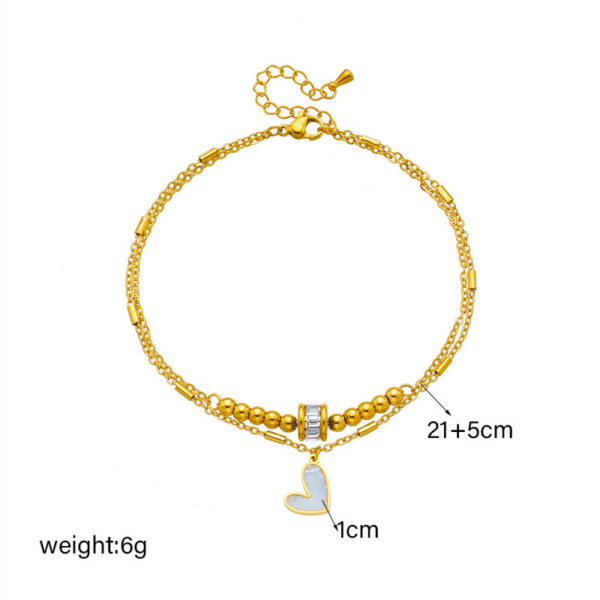 4dcf74d6-5e67-452a-be19-3ba2895141b9.jpg Boho Heart Tassel Anklet – Double Layer Chain