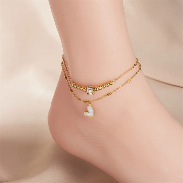 58a815e0-5ae7-43c5-9e71-d20f6c2c391c.jpg Boho Heart Tassel Anklet – Double Layer Chain