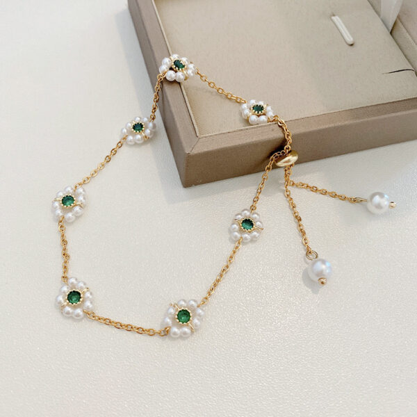 O1CN01Oc0MlL2N6fYMcspEu_2216640519914-0-cib.jpg Pearl Flowers Bracelet All-match Fashion Adjustable Chain Bracelet