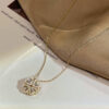 Retro Four-Leaf Clover Magnetic Heart Pendant Necklace™ – Foldable Love Choker for Women