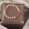 c3f45c59-e74c-4aab-975a-9382a47a46d1.jpg Women Irregular Freshwater Pearl Adjustable Bracelet