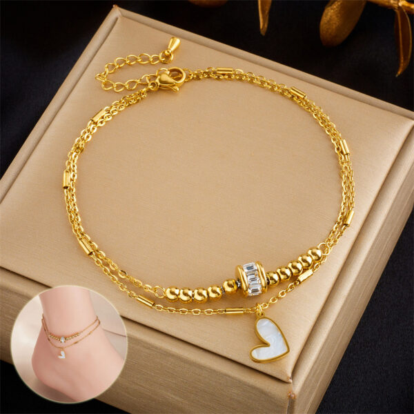 ceee9c04-ac12-4989-889d-1464991ec7a0.jpg Boho Heart Tassel Anklet – Double Layer Chain