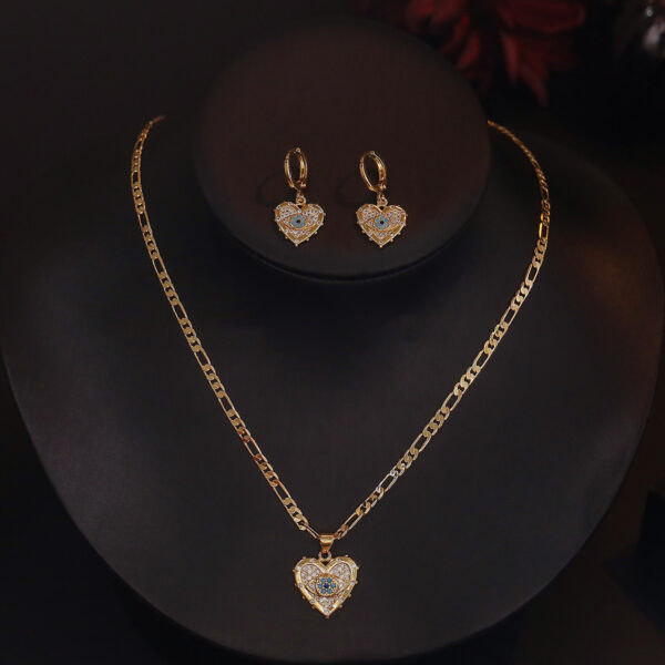 6be60ae4-1fa5-4a29-8d45-50a4a77e912b.jpg Fashion Jewelry Personality Copper Plated Real Gold Heart-shaped Zircon Pendant Necklace And Earrings Suite