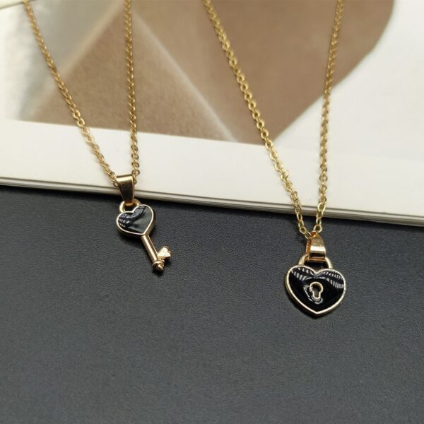 99c95af3-b42e-4040-acad-cdc5a0695f6c.jpg A Pair Of Lovers Necklace Small Key Lock Love Pendant